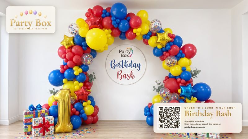 Birthday Bash balloon arch in red, royal blue and yellow