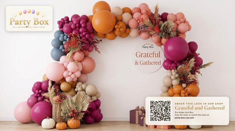 Grateful and Gathered balloon arch: terracotta, deep plum, dusty peach and sand balloons with dried pampas, wheat and mini pumpkins for a fall Thanksgiving table